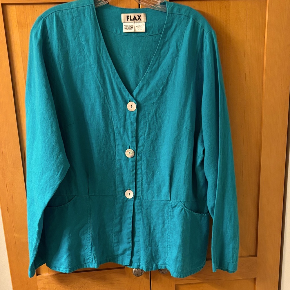 Flax Teal V-Neck blouse (looks good as a jacket also), made of 100% linen.